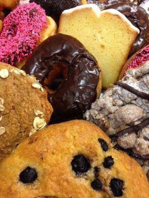 Breakfast cake platter with muffins, crumb cake and loaf cake