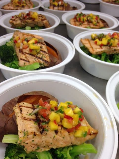 Individually packaged grilled salmon with mango salsa lunches